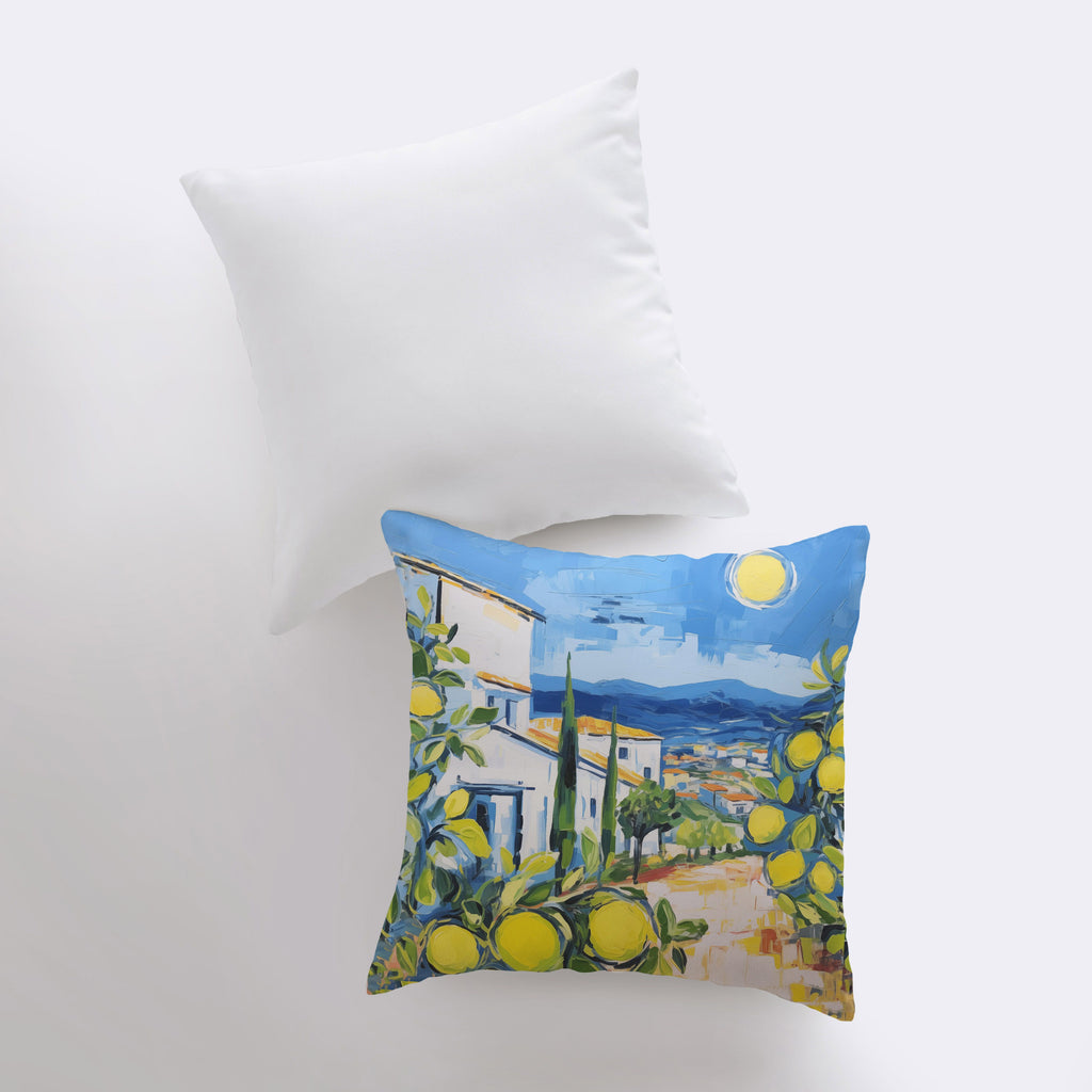 a pillow with a painting of lemons on it