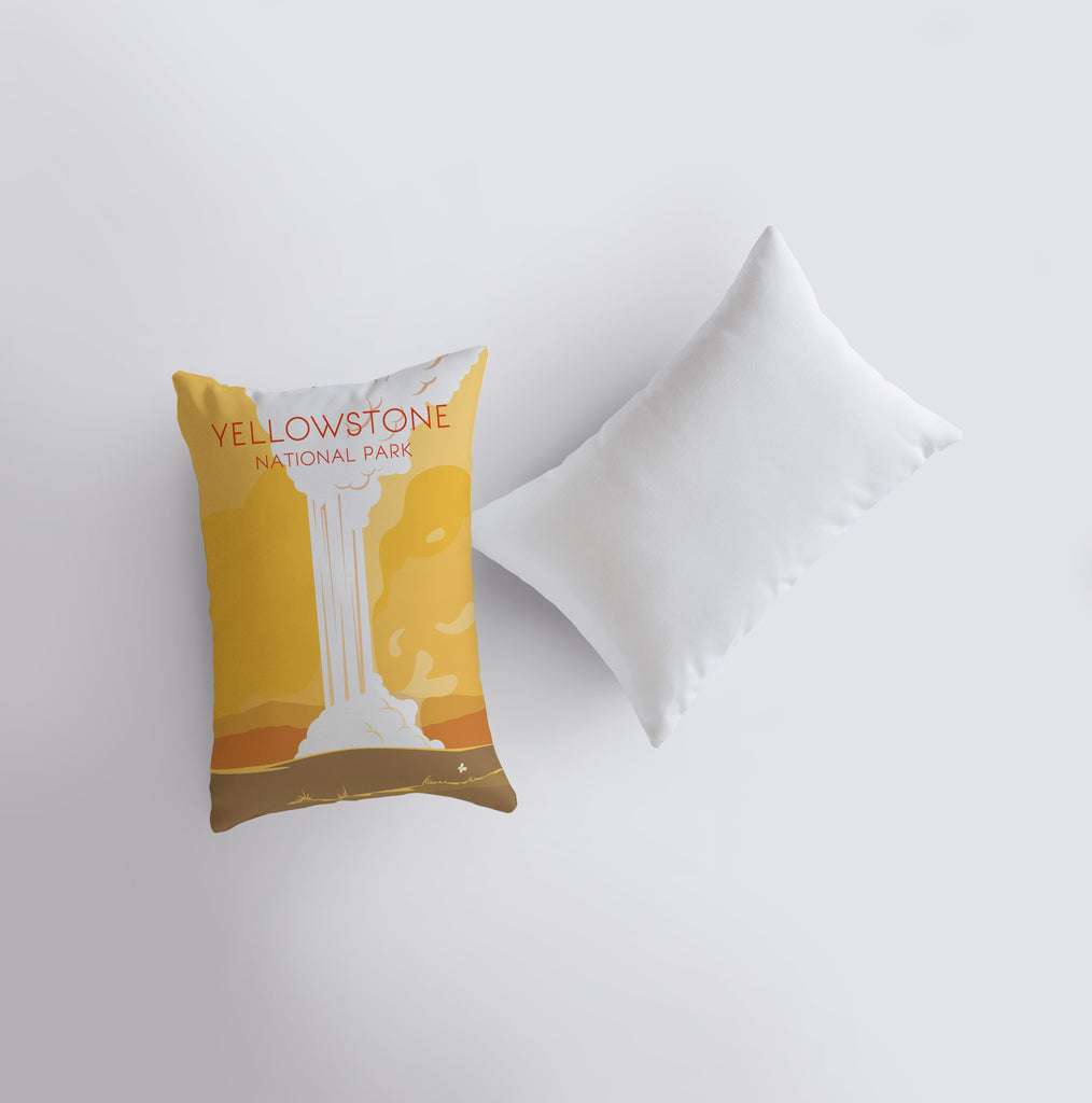 a yellow pillow and a white pillow on a white surface