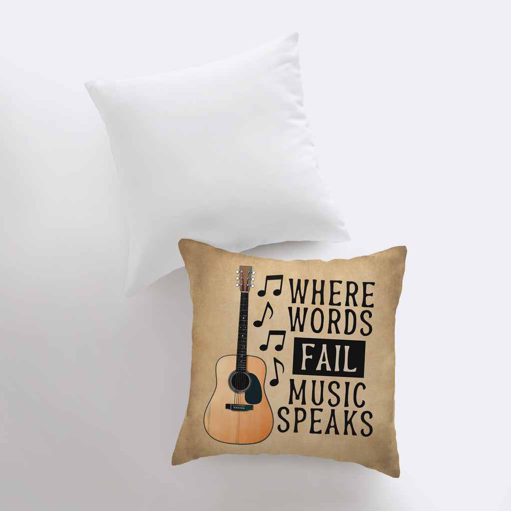 a pillow that has a guitar on it