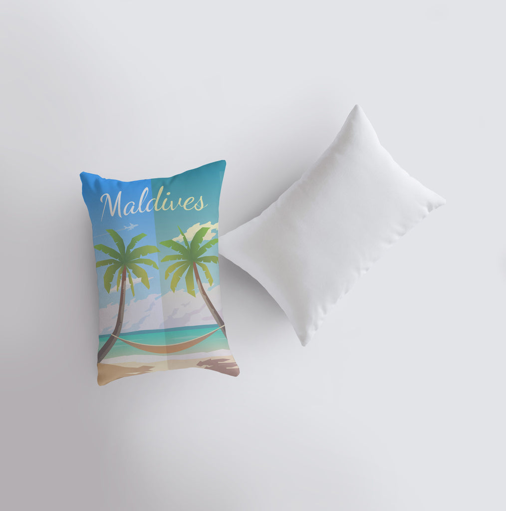 a pillow with a picture of a palm tree on it