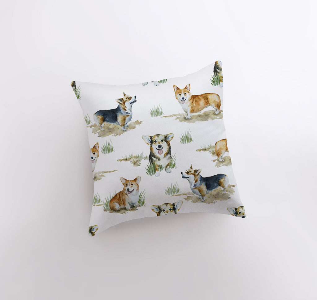 a pillow with a pattern of corgis on it