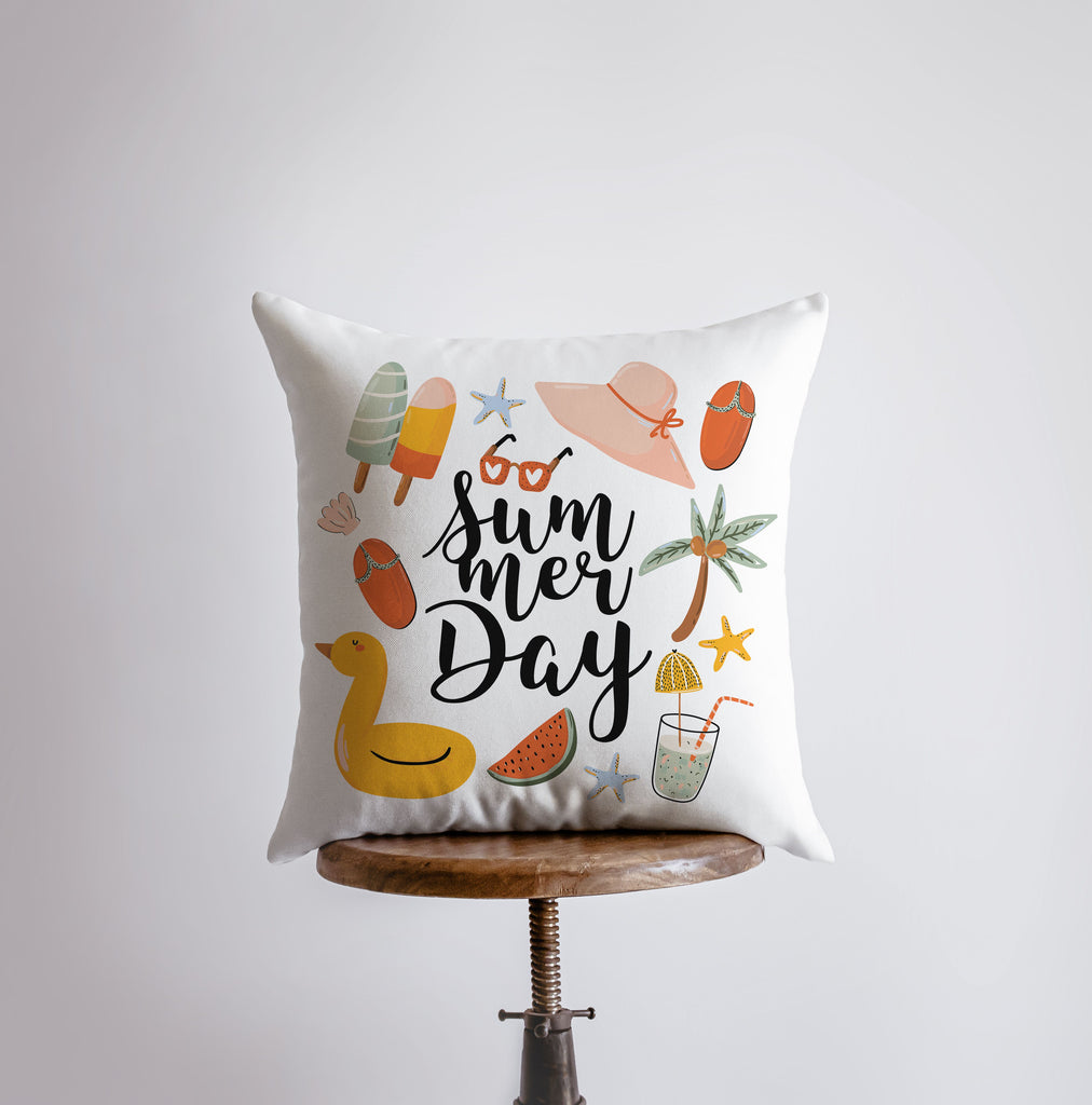 a white pillow with the words summer day printed on it