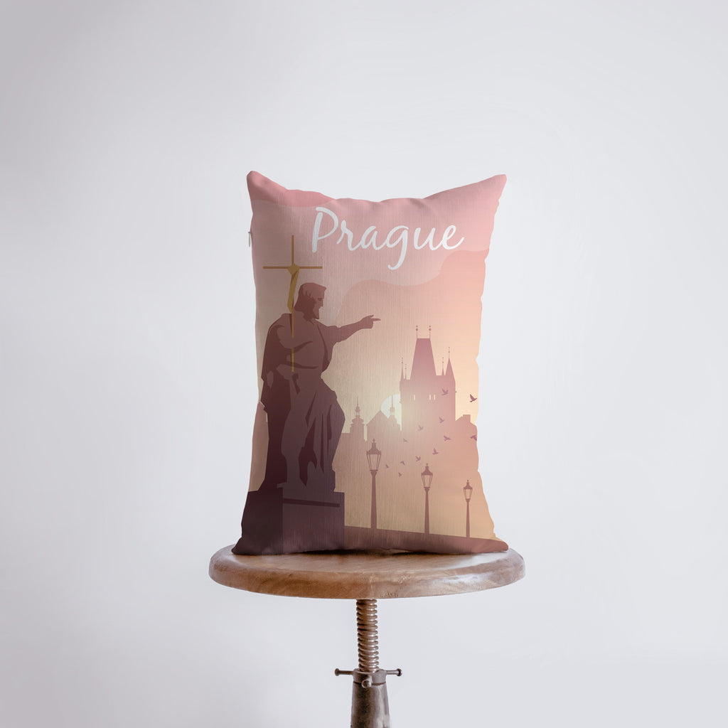 a pillow that has a picture of a statue on it