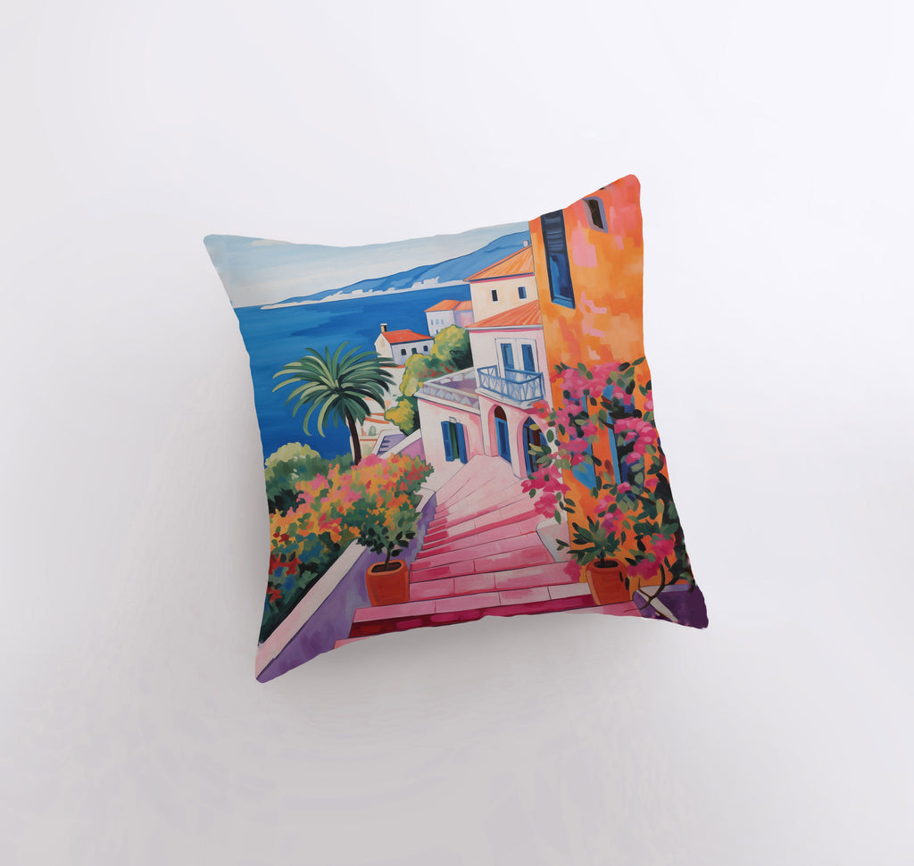 a pillow with a painting of a house on it