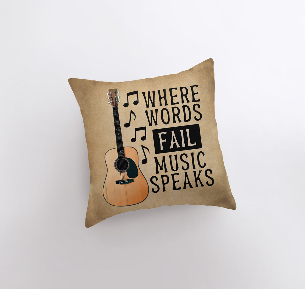 a pillow that has a guitar on it