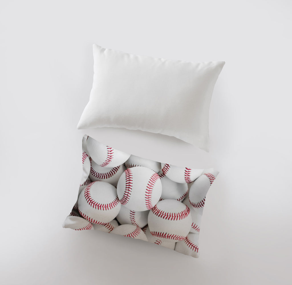 a pillow with baseballs on it and a pillow case