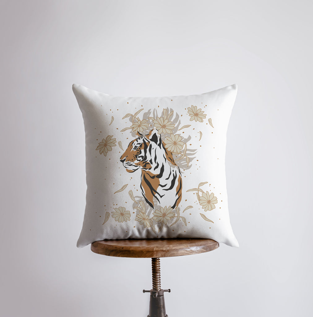 a white pillow with a tiger on it