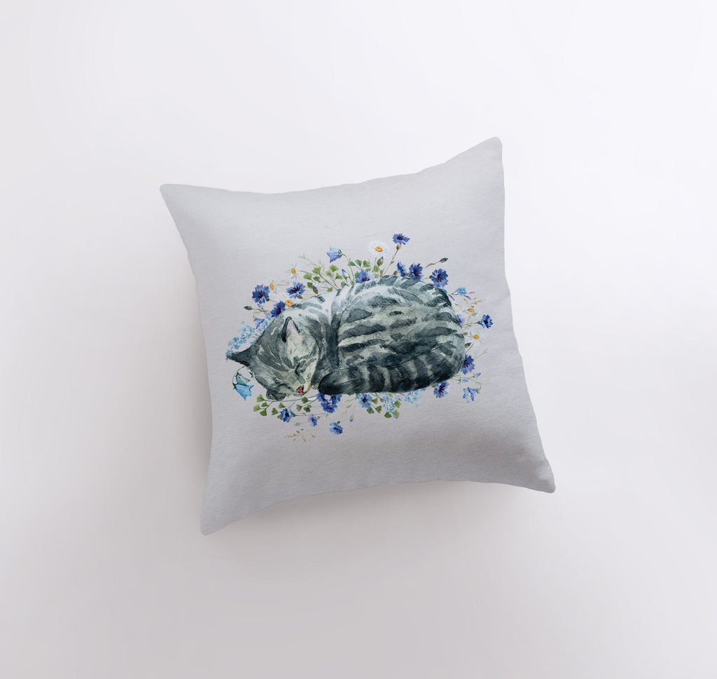 a pillow with a picture of a cat on it