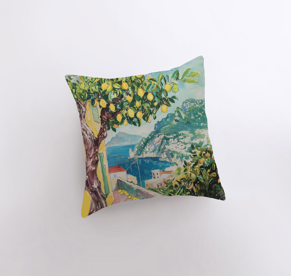 a pillow with a painting of a lemon tree