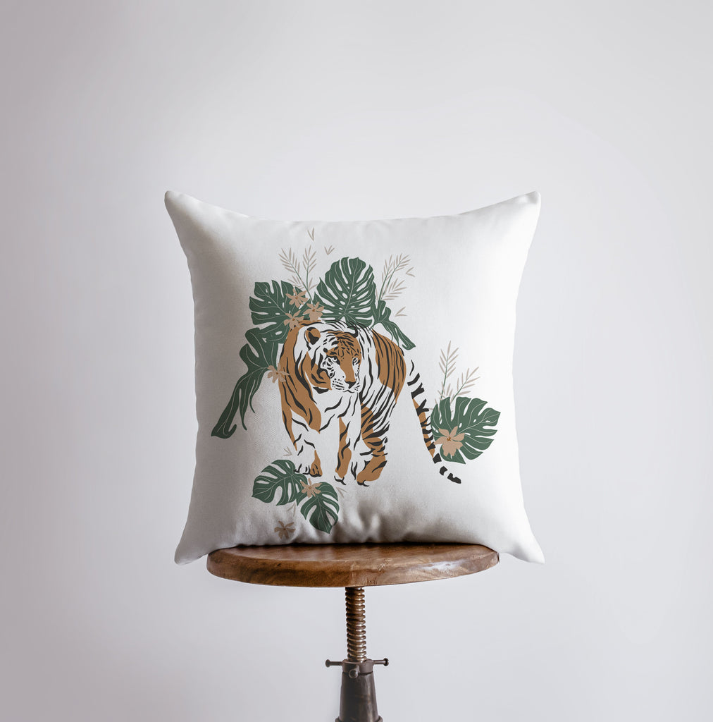 a white pillow with a tiger on it