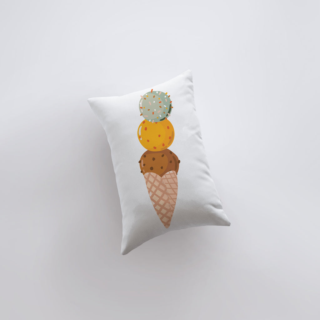 a pillow that has a picture of a cone on top of it
