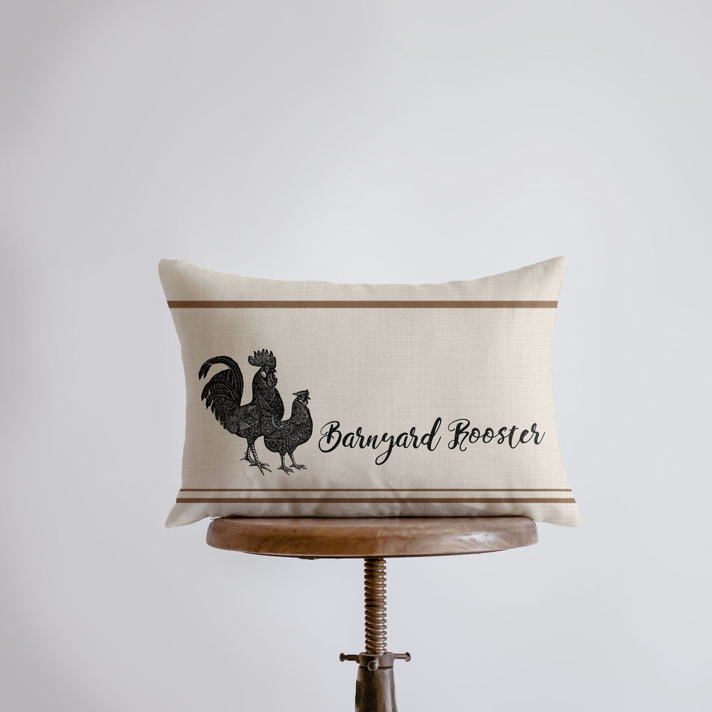 a pillow that has a rooster on it