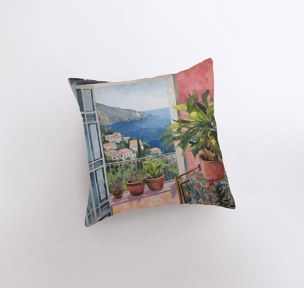 a pillow with a painting of a balcony with potted plants