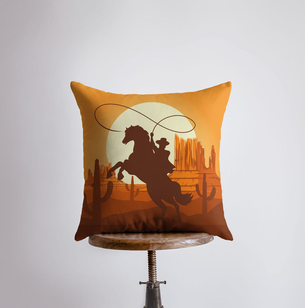 a pillow with a cowboy riding a horse