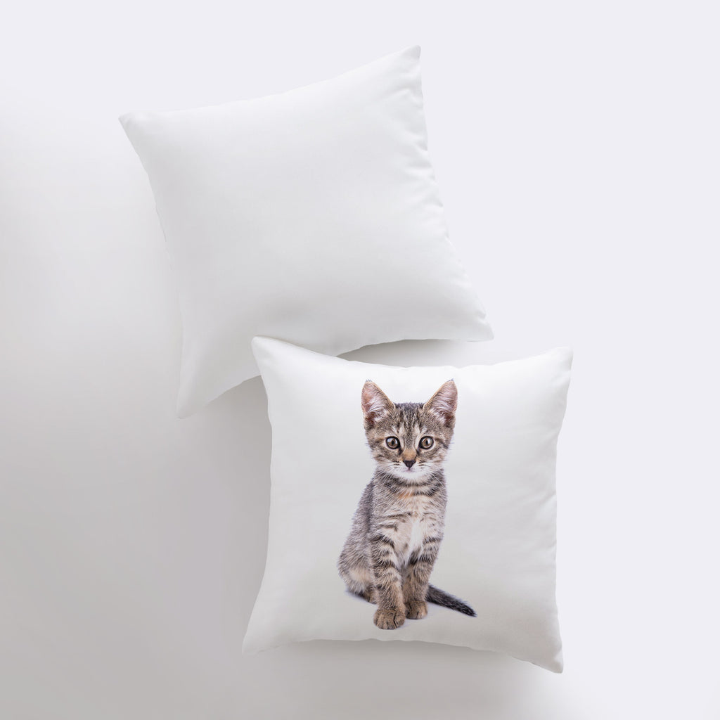 a pillow with a picture of a cat on it