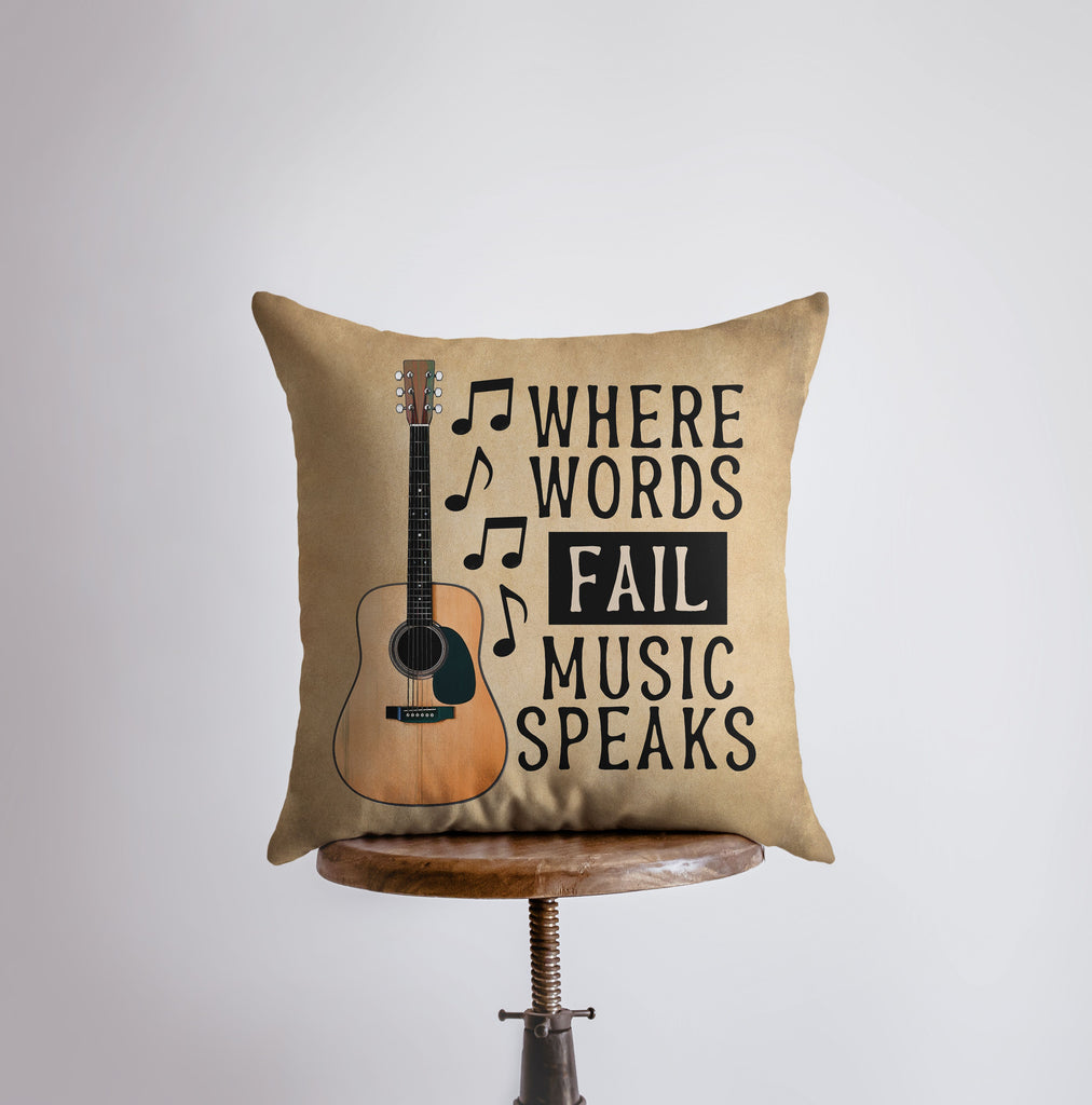 a pillow that has a guitar on it