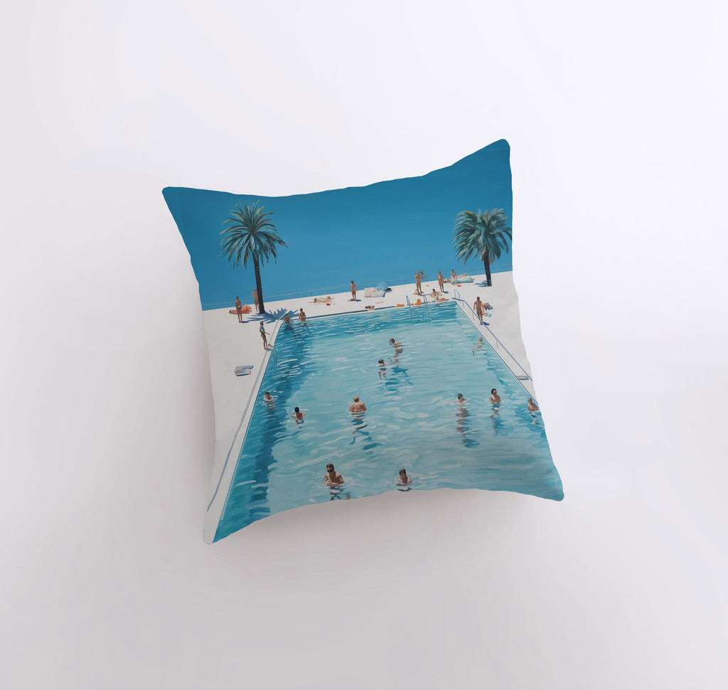 a pillow with a picture of people swimming in a pool