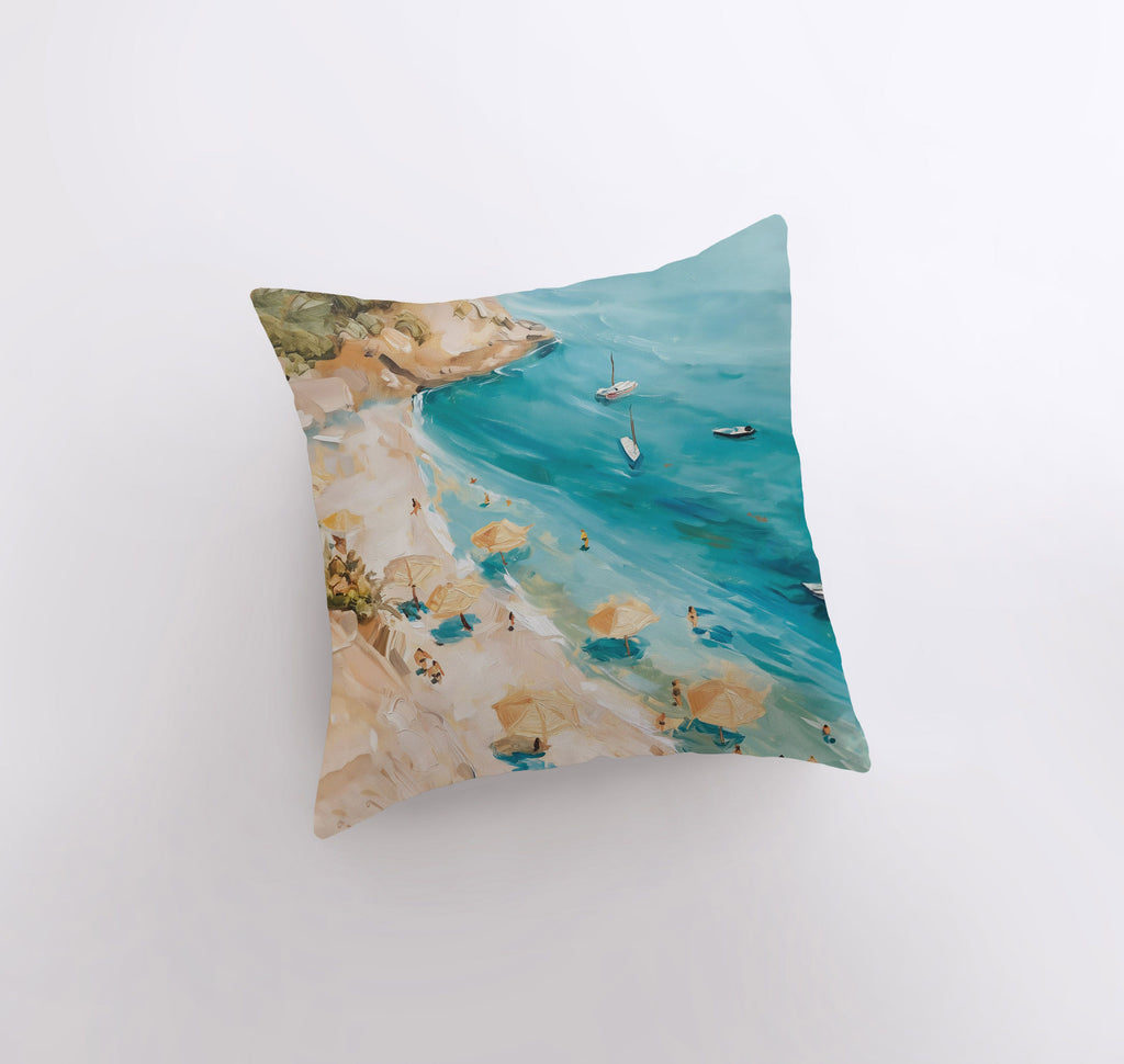 a pillow with a painting of a beach scene