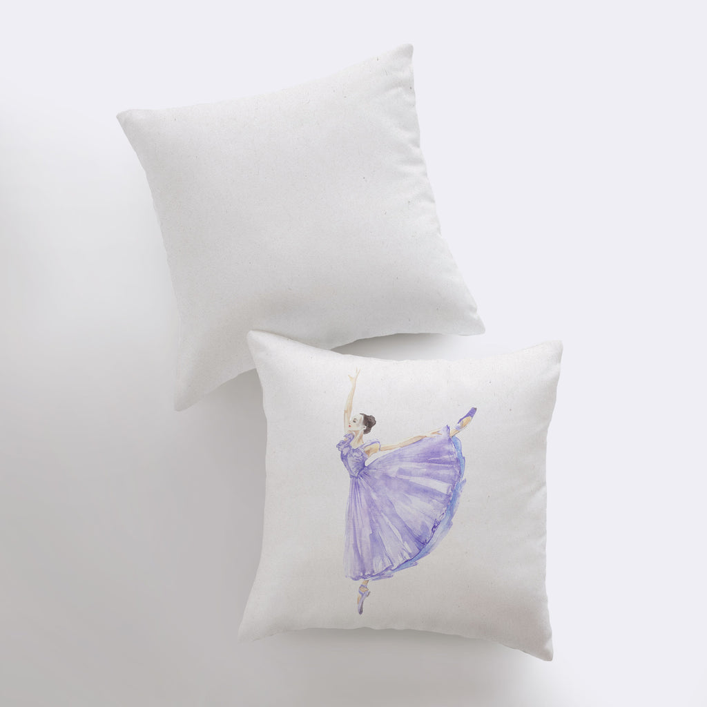 a pair of pillows with a ballerina on them
