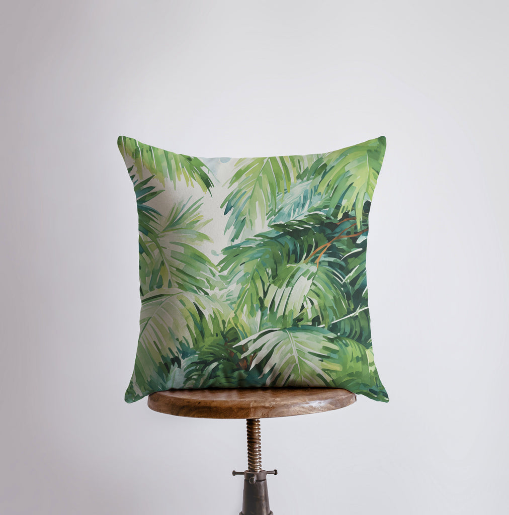 a pillow with a tropical print on it