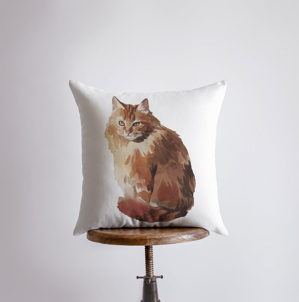 a pillow with a picture of a cat on it