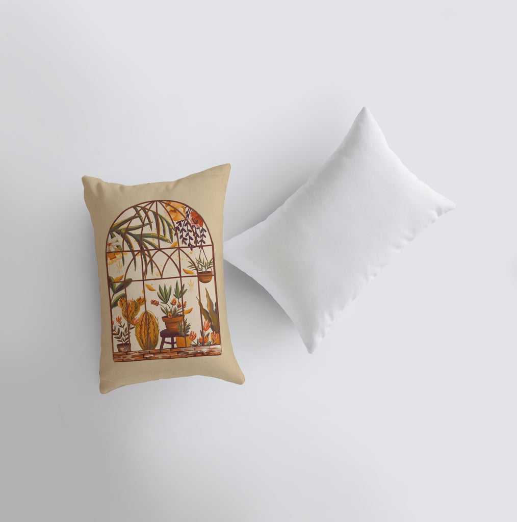 a pillow with a painting on it next to a pillow case