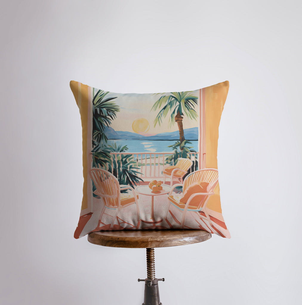 a pillow that has a picture of a table and chairs on it