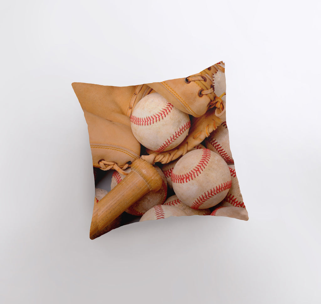 a pillow with a baseball and glove on it