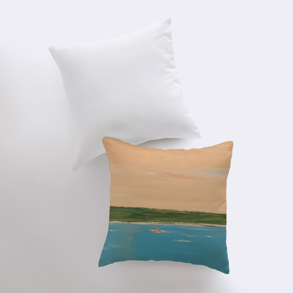 a pillow with a painting of a boat on the water