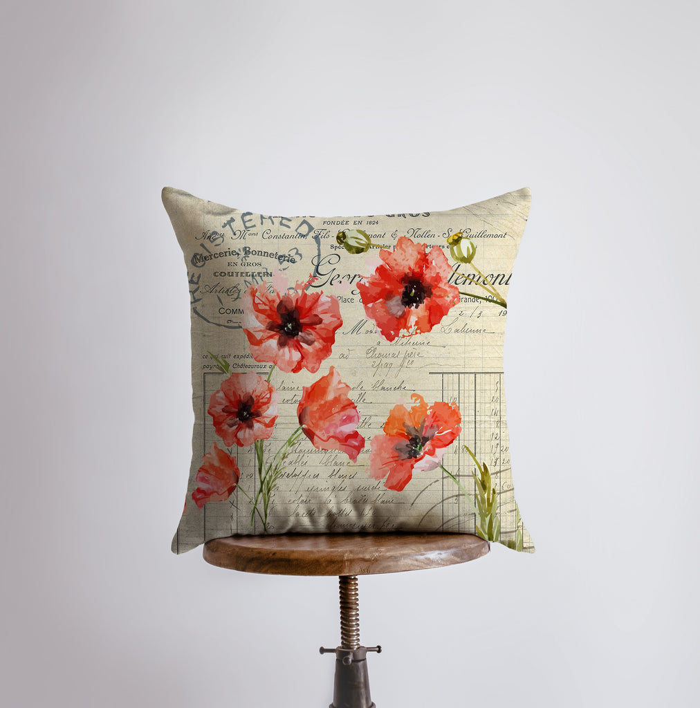 a pillow that has a bunch of flowers on it