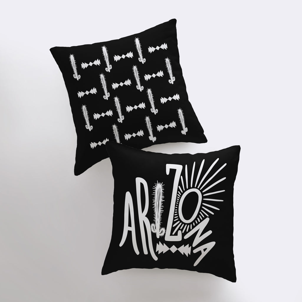 two black pillows sitting on top of each other