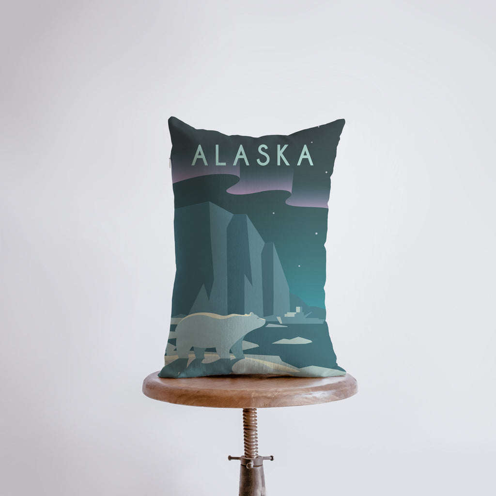 a pillow that has a picture of a polar bear on it