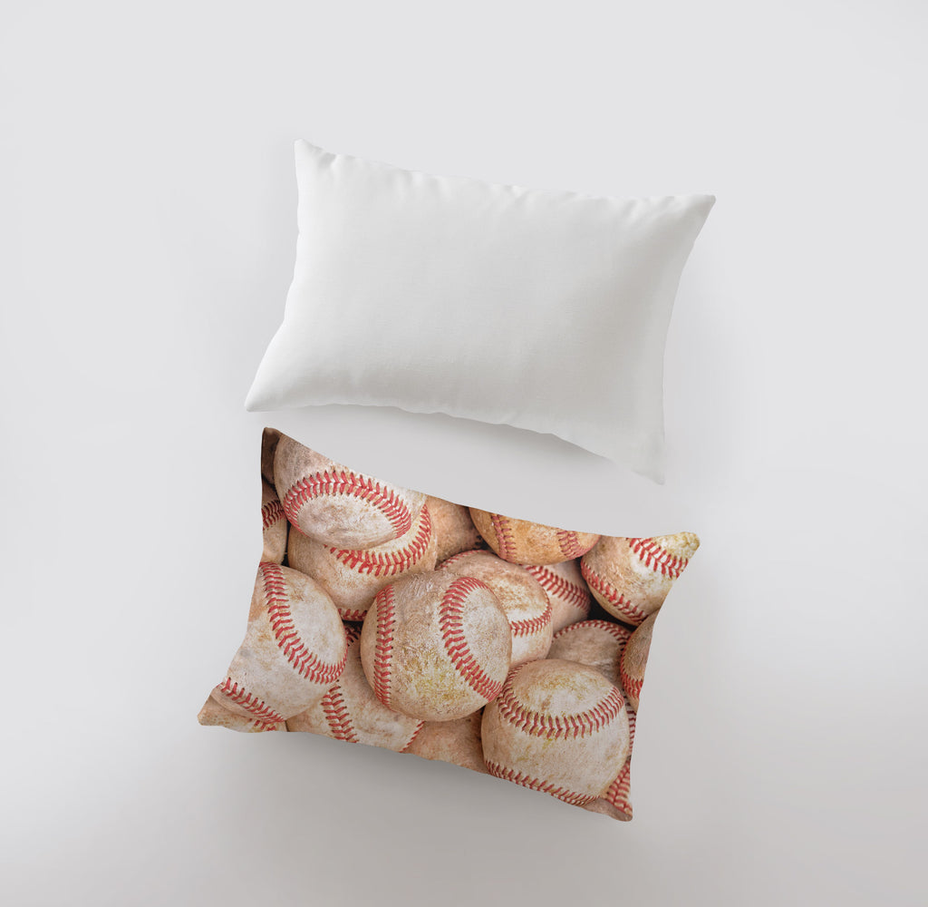 a pillow with a baseball pattern on it