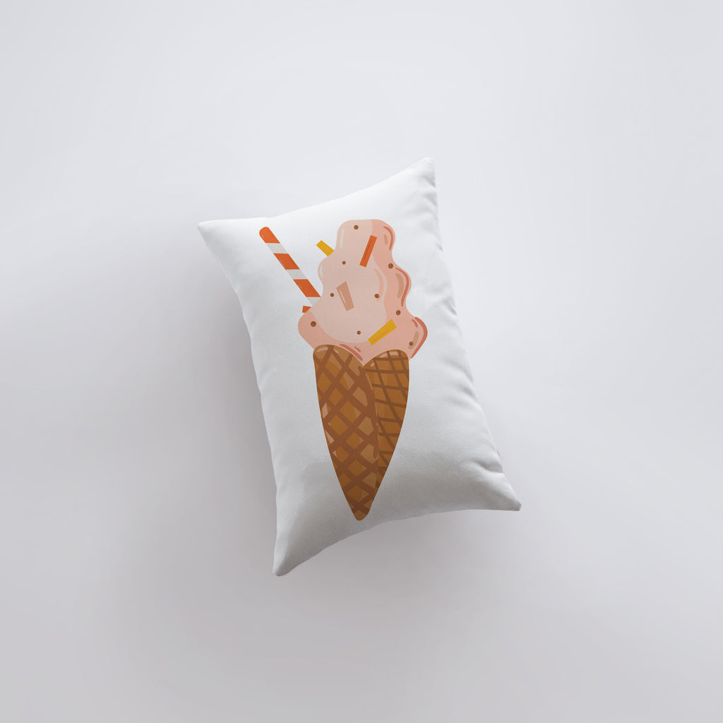 a pillow with an ice cream cone on it