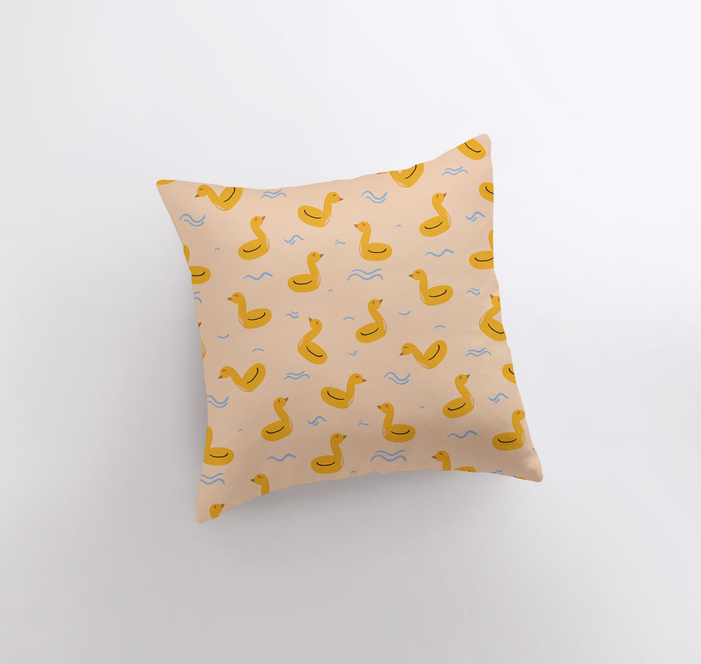 a pillow with a rubber ducky pattern on it