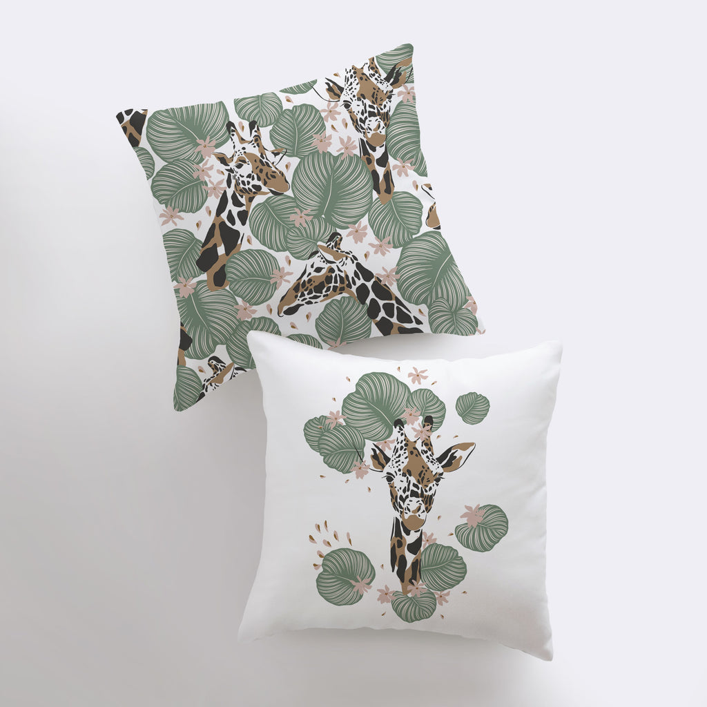 two pillows with giraffes and leaves on them