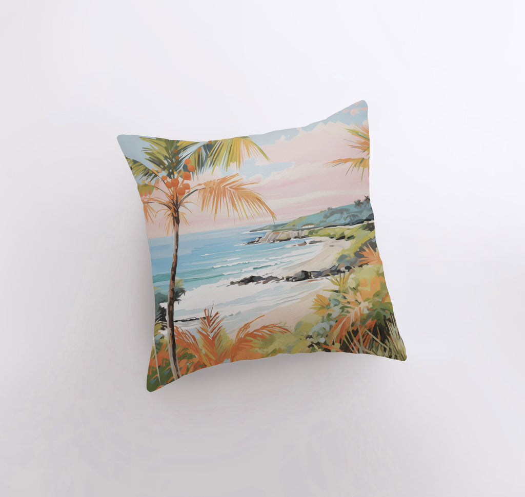 a pillow with a painting of a beach and palm trees