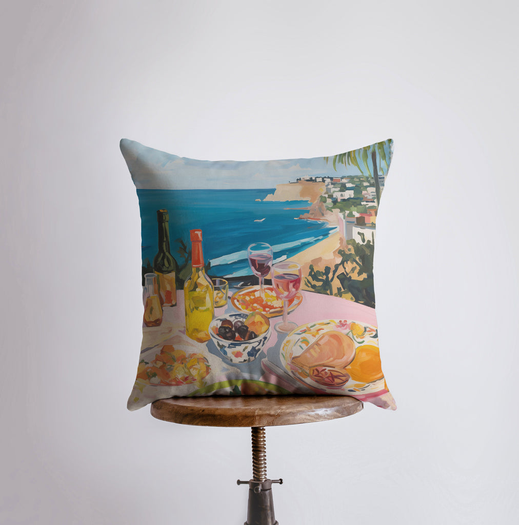 a pillow with a picture of a beach scene on it