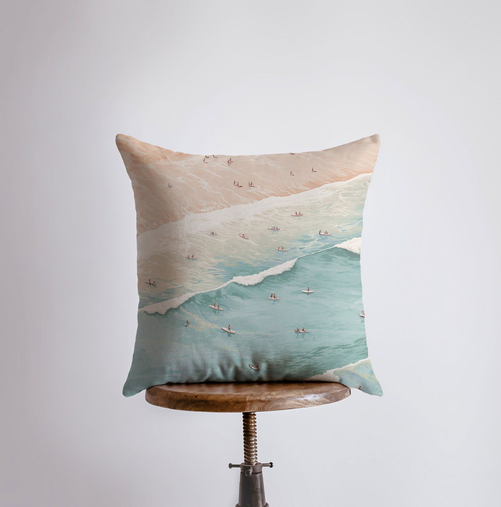 a pillow that has a picture of a beach on it