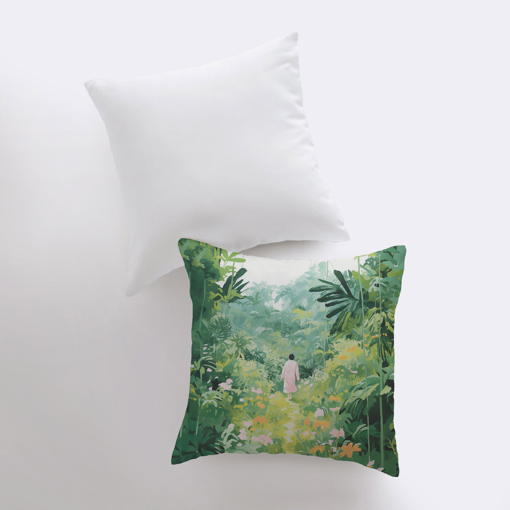 a pillow with a painting of a person walking through a jungle