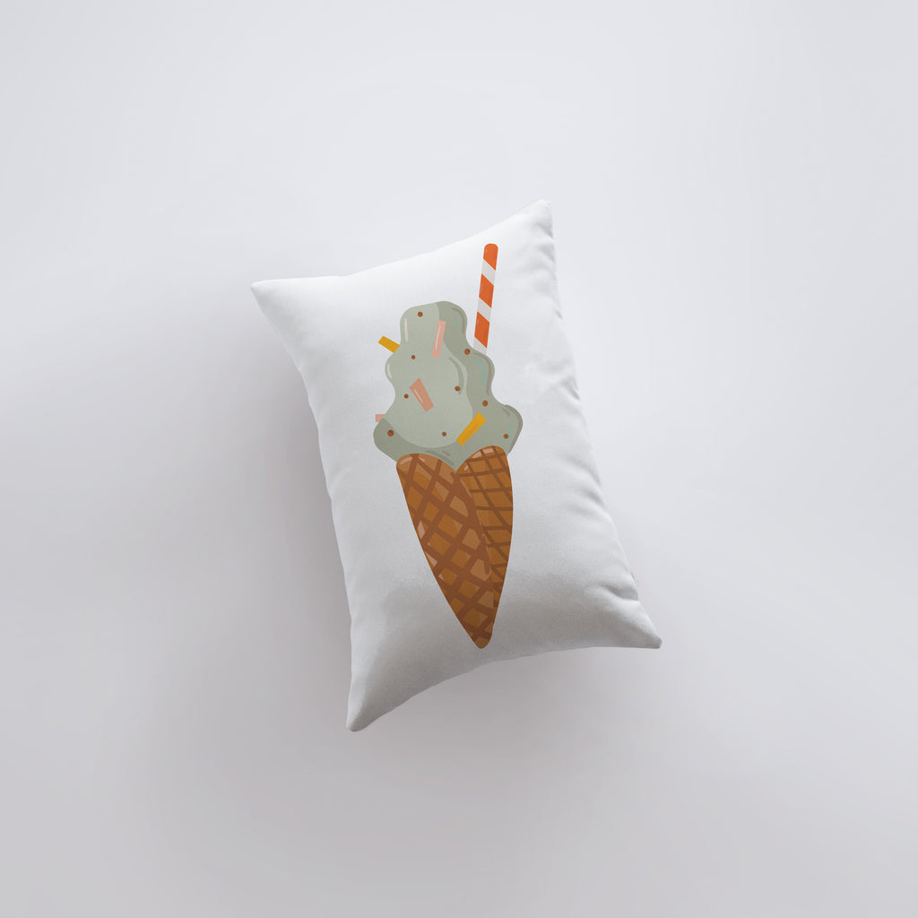 a pillow with an ice cream cone on it