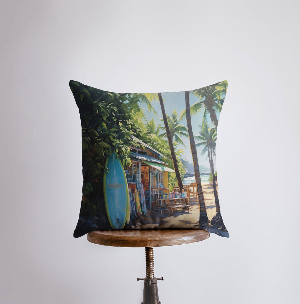 a pillow with a painting of surfboards on it