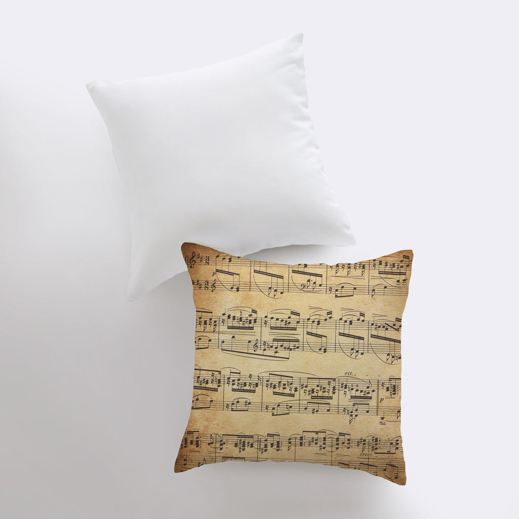 a pillow that has sheet music on it