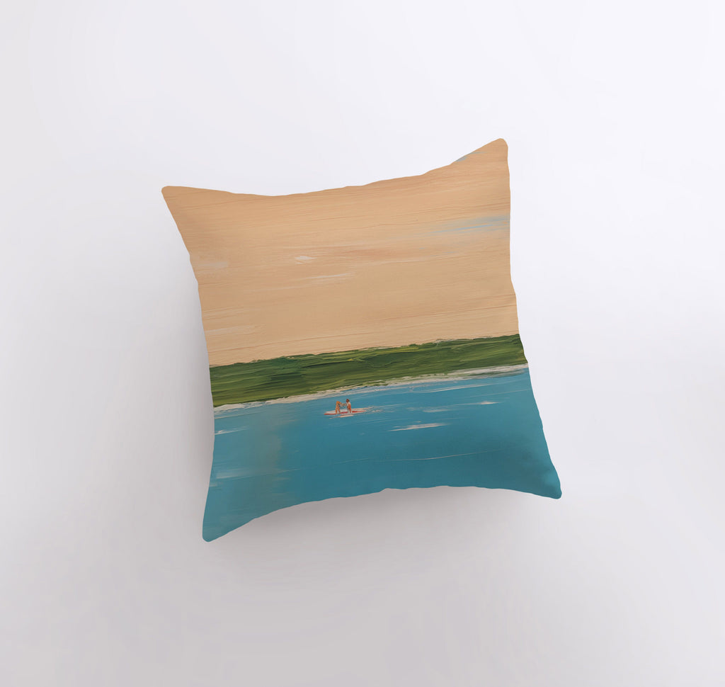 a pillow with a painting of a boat on the water