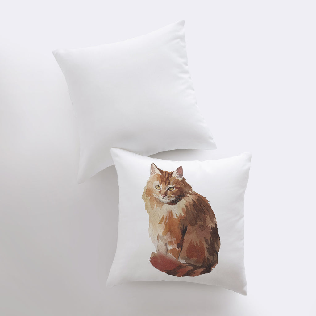 two pillows with a picture of a cat on them