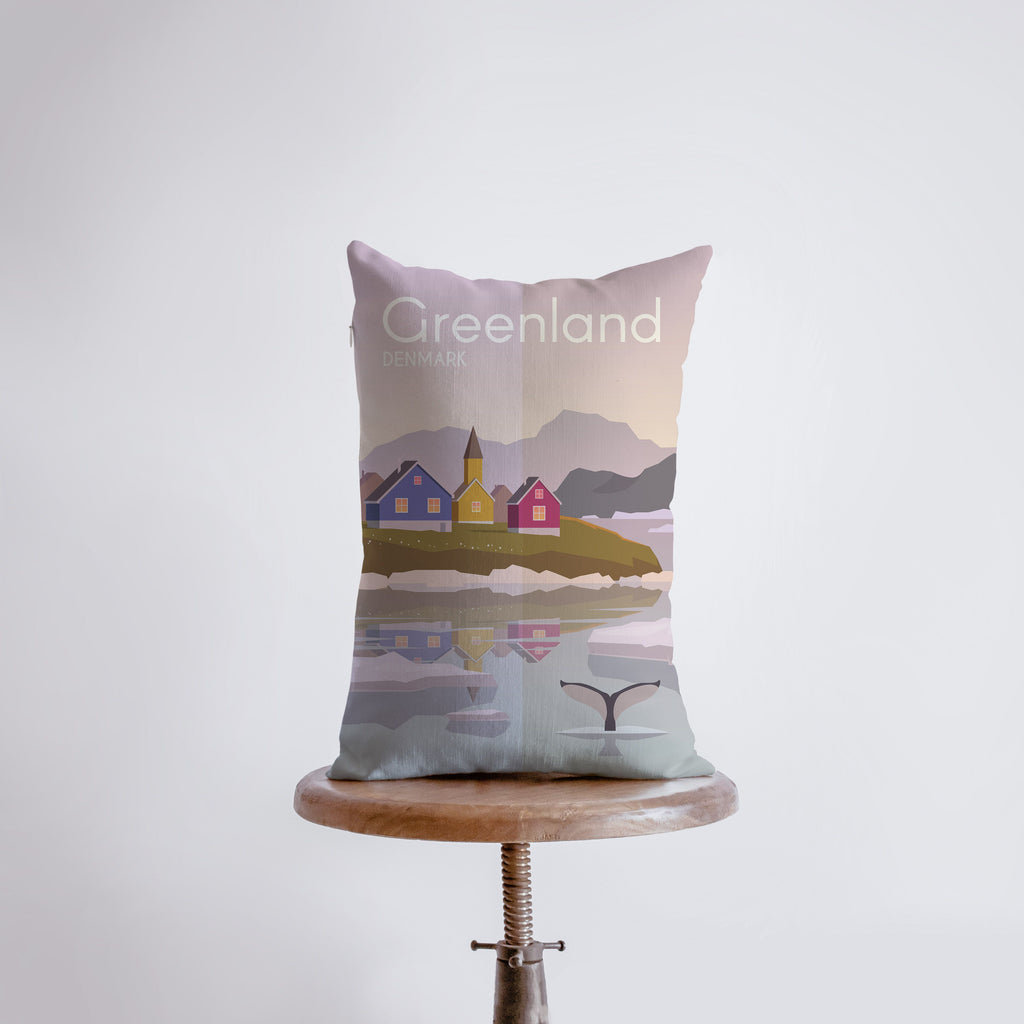 a pillow sitting on top of a wooden table