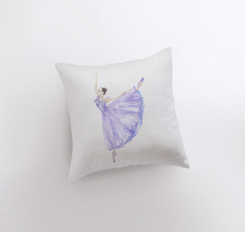 a pillow that has a ballerina on it
