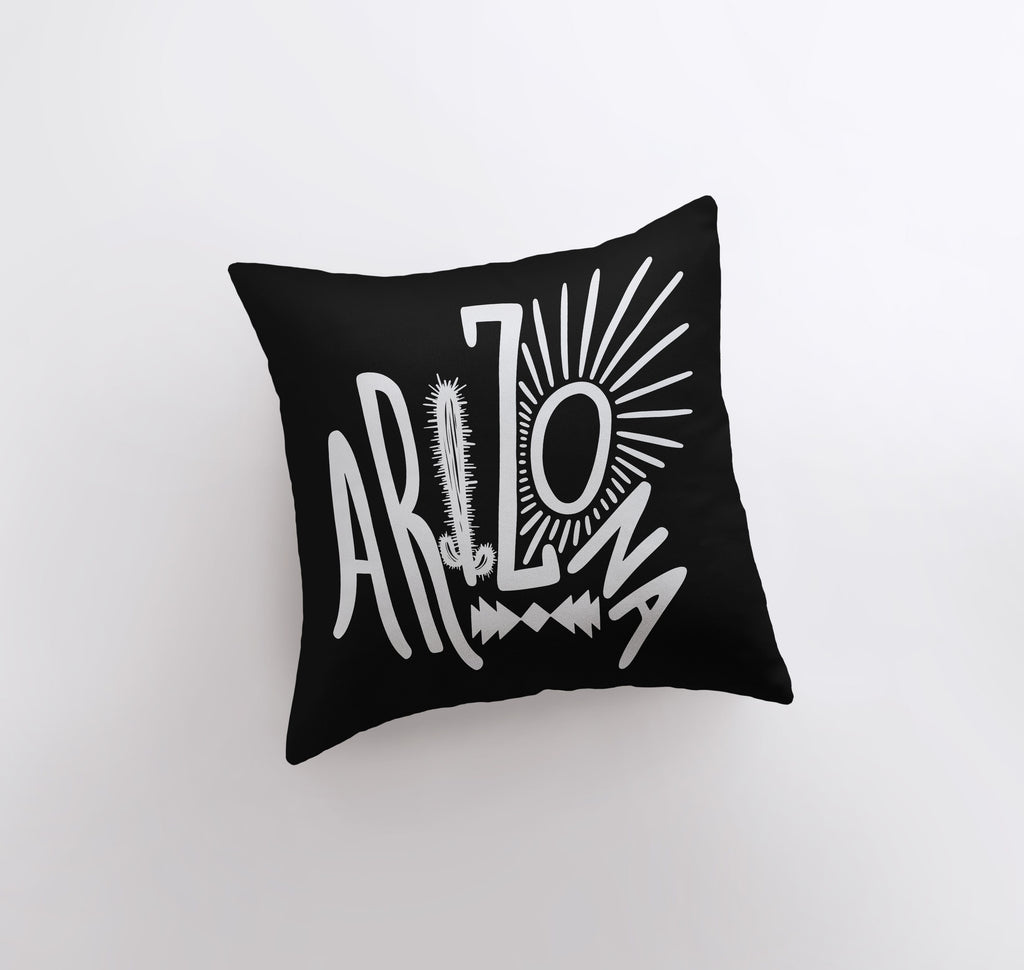 a black and white pillow with the words arlo on it