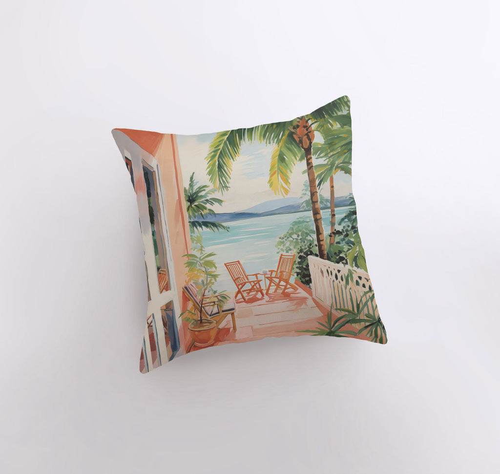 a pillow with a painting of a beach scene