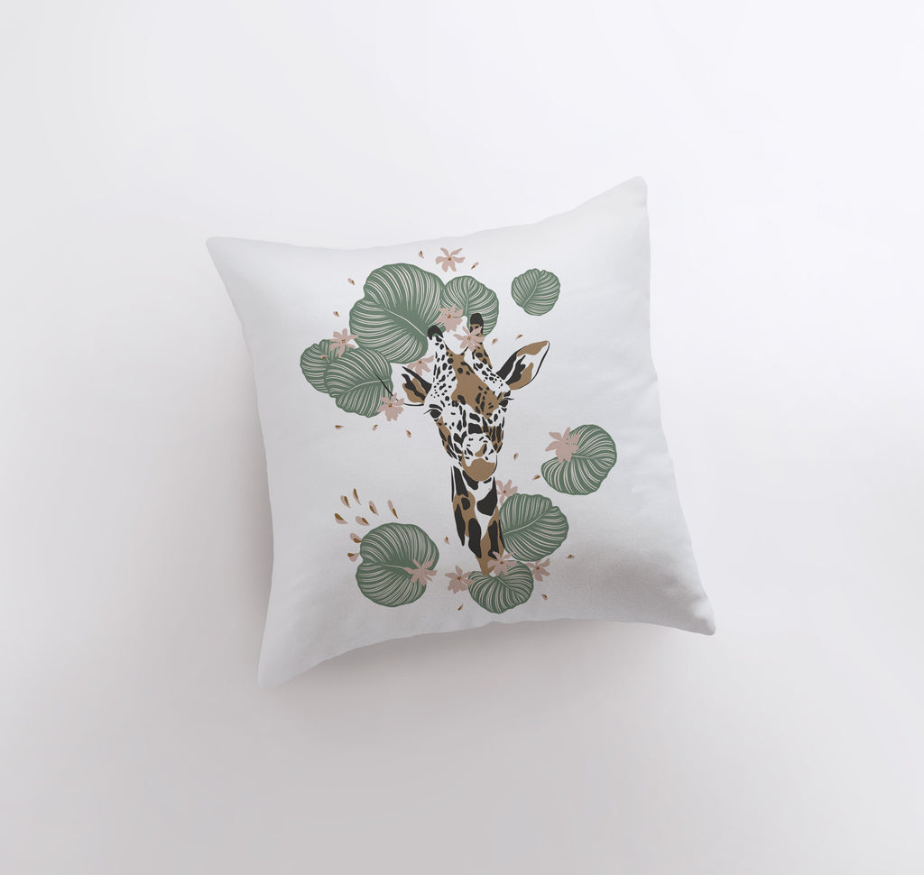 a white pillow with a giraffe on it